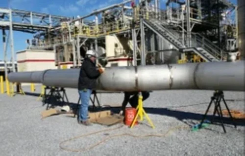 Coal piping erection work in progress at an industrial power plant